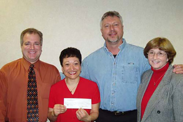 Pictured are Anthony Andello, Director Cancer Resource Centre, Mary C. Shields, Cancer Research Foundation, Inc. Administrator, Ron Kittle, Chairman Indiana Sports Charity and Pat Giannini, Director of Development, Community Foundation of Northwest Indiana.